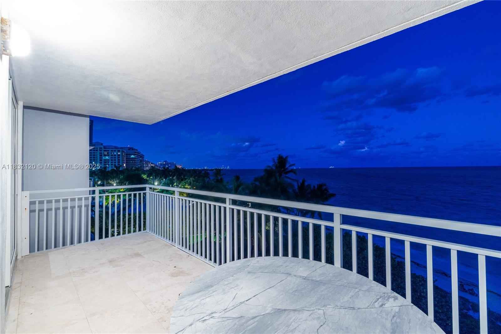 615 Ocean Drive, Unit 6A Key Biscayne, FL 33149 - Photo 30 of 40 a view of balcony with wooden floor