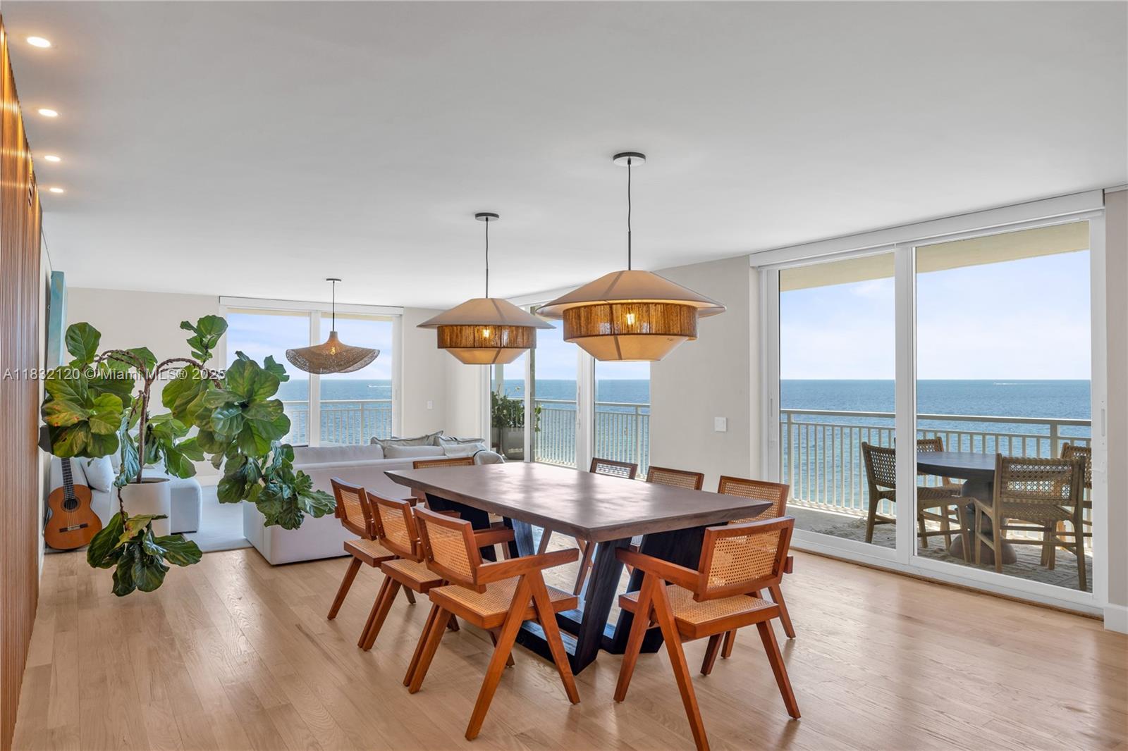 615 Ocean Drive, Unit 6A Key Biscayne, FL 33149 - Photo 3 of 40 a dining room with furniture window and wooden floor