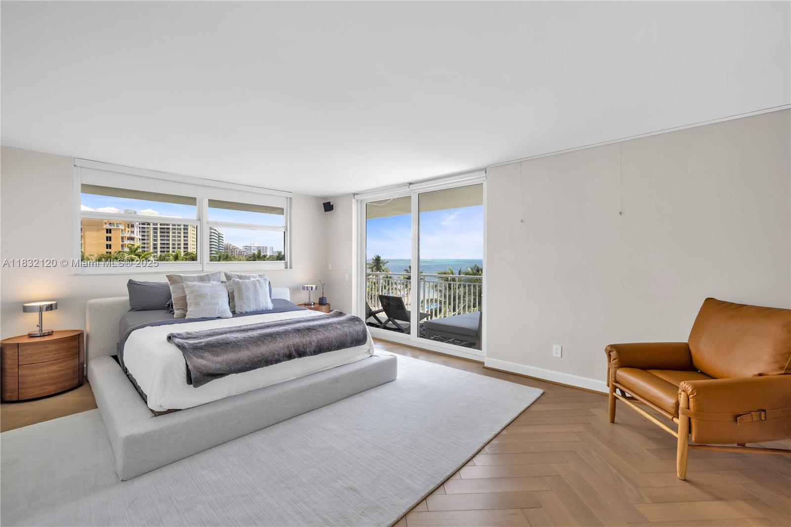 615 Ocean Drive, Unit 6A Key Biscayne, FL 33149 - Photo 8 of 40 a living room with furniture and a large window