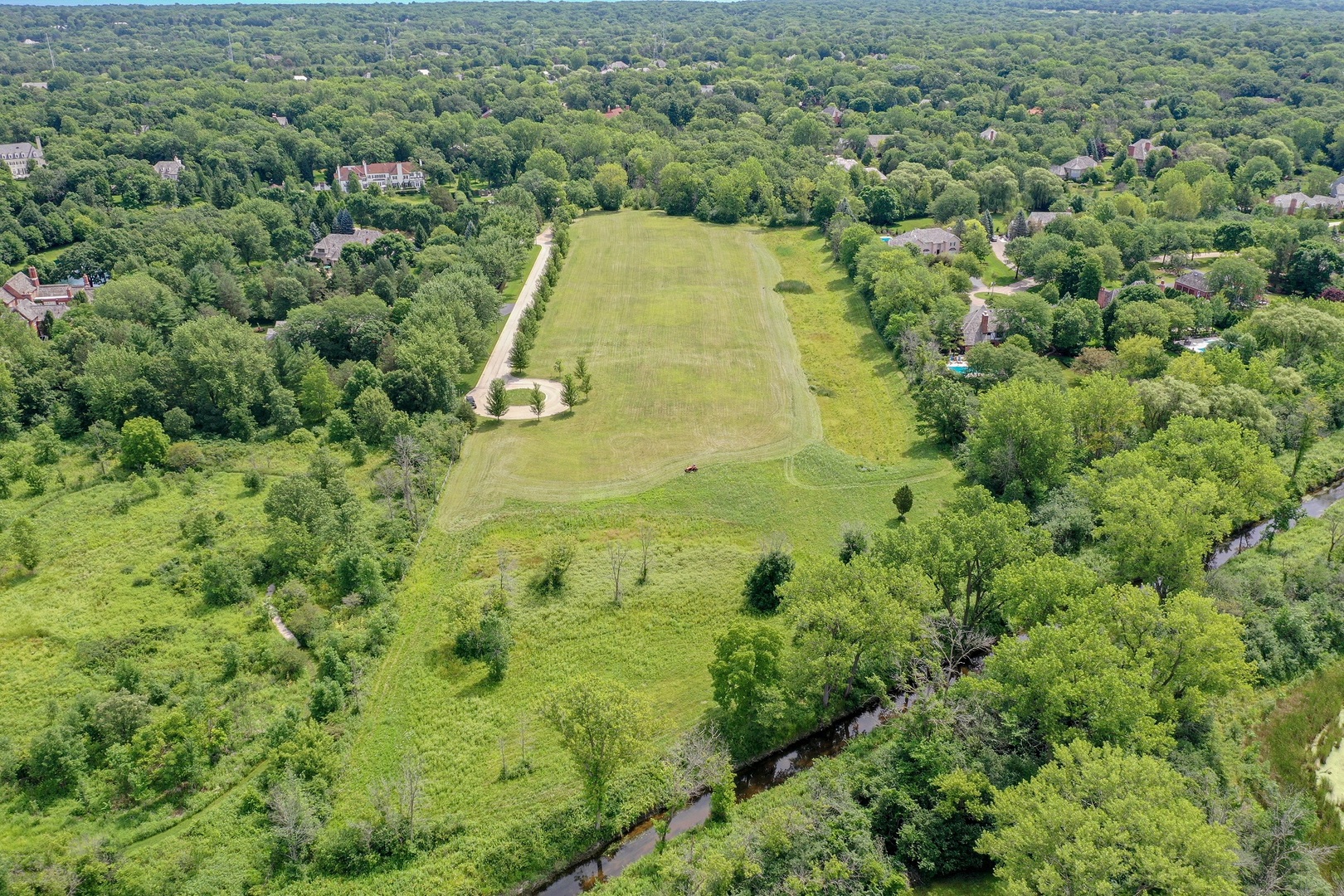 Lot 8 Whitehall Lane Lake Forest, IL 60045 - Photo 2 of 10 an aerial view of residential houses with outdoor space and trees