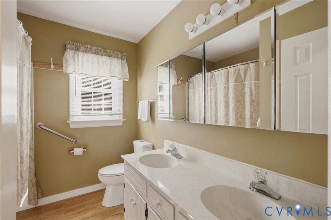 13905 Shadow Ridge Lane Midlothian, VA 23112 - Photo 38 of 55 Double vanity with integrated sinks, wood-finish f