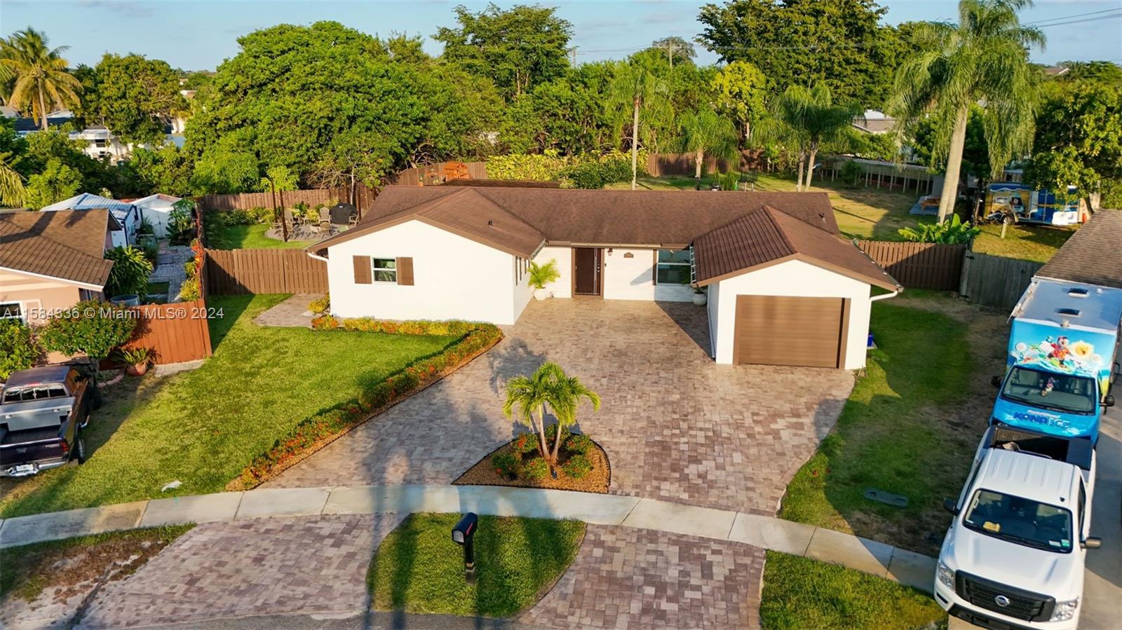 10300 Sleepy Brook Way Boca Raton, FL 33428 - Photo 3 of 41 an aerial view of a house