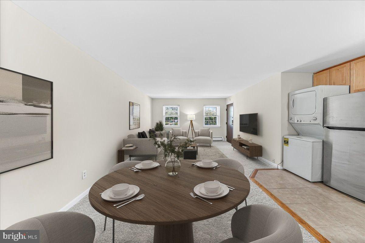 4701 Pennell Road, Unit D8 Aston, PA 19014 - Photo 8 of 25 Digitally Staged Living/Dining Rooms