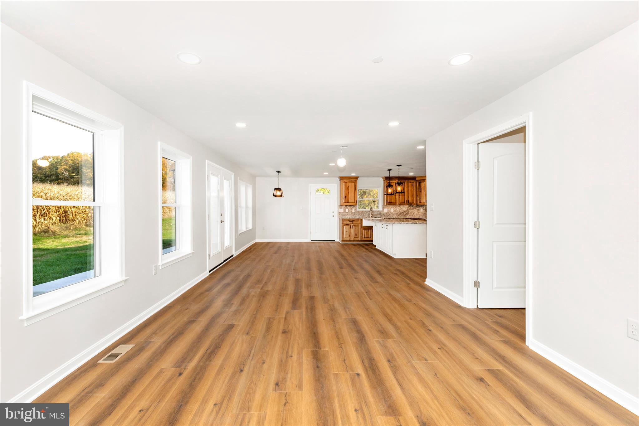 10910 Liberty Road Frederick, MD 21701 - Photo 17 of 51 a view of livingroom with wooden floor