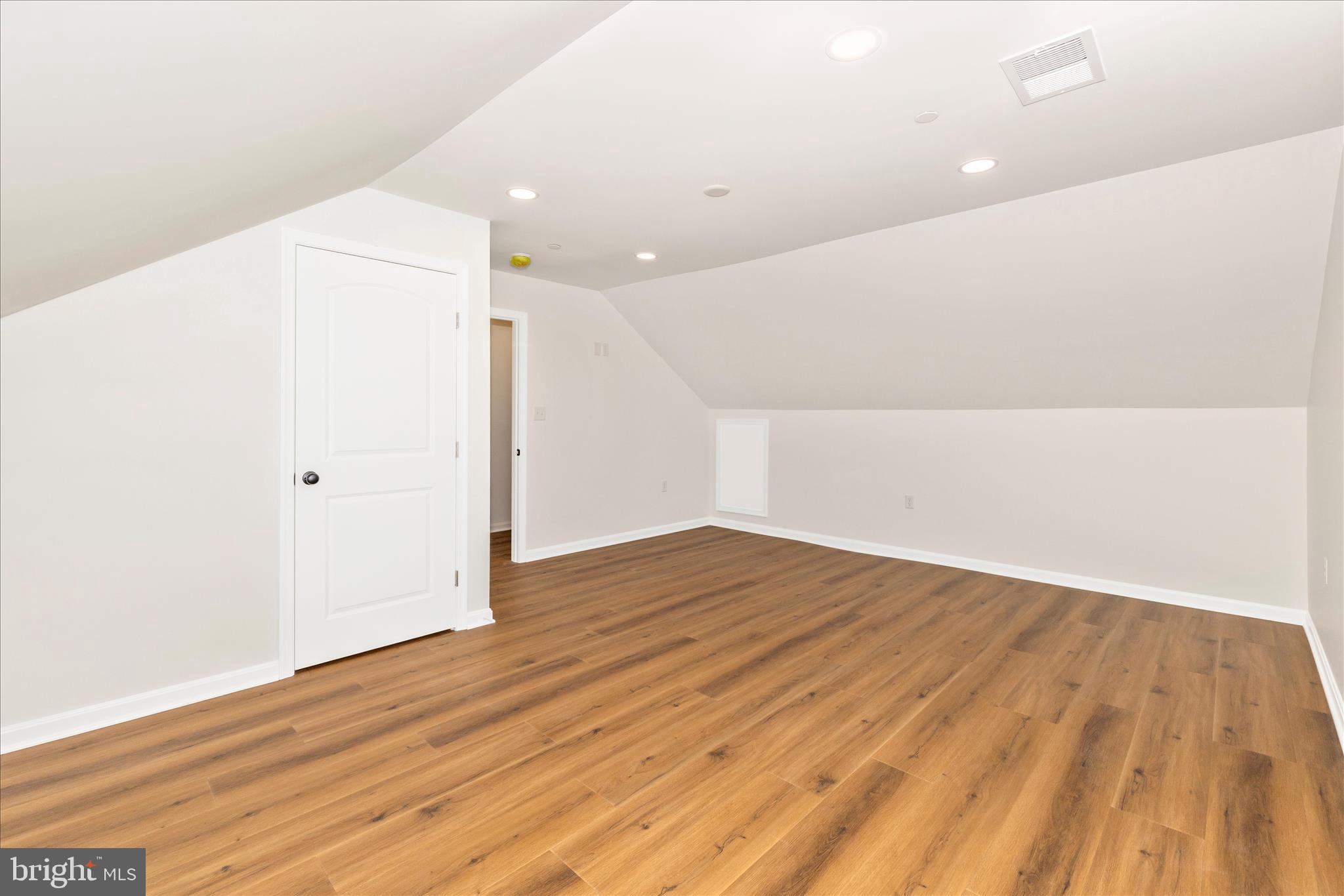 10910 Liberty Road Frederick, MD 21701 - Photo 34 of 51 an empty room with wooden floor