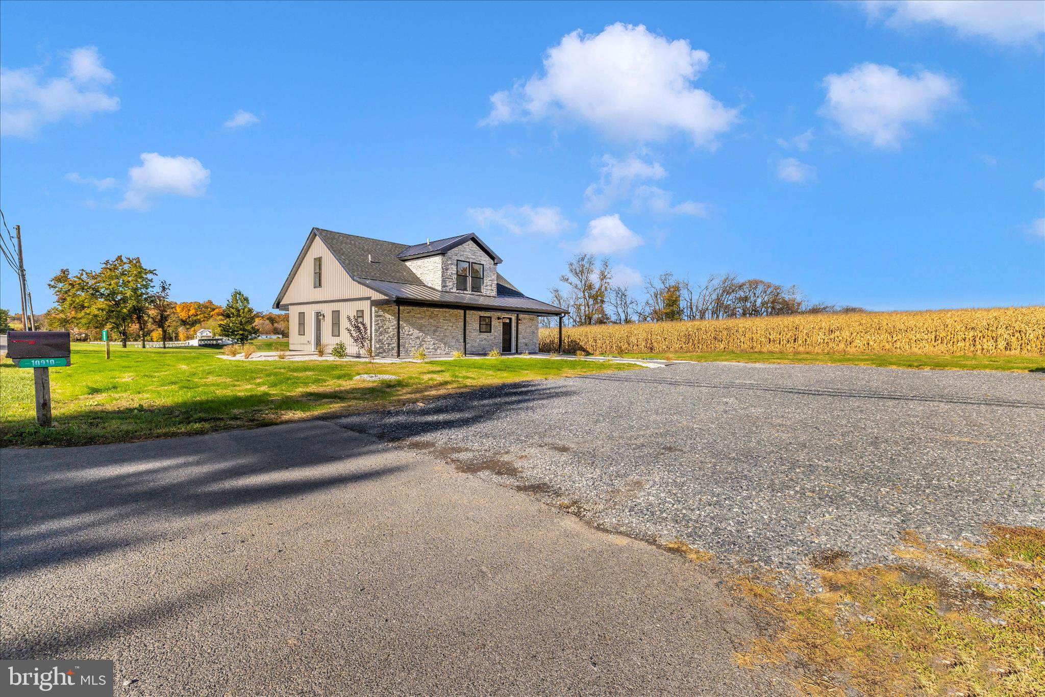 10910 Liberty Road Frederick, MD 21701 - Photo 39 of 51 a view of a house with a yard and lake view