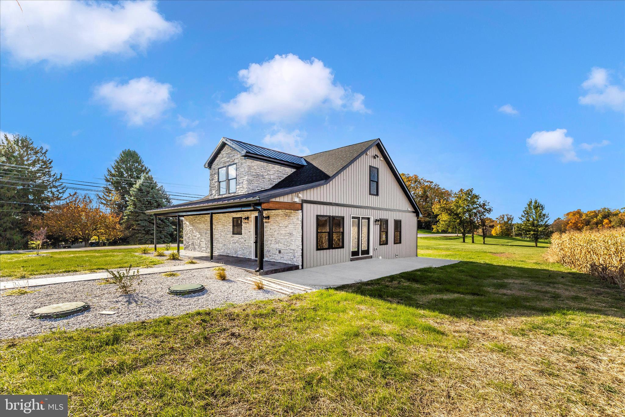 10910 Liberty Road Frederick, MD 21701 - Photo 46 of 51 a front view of a house with a yard