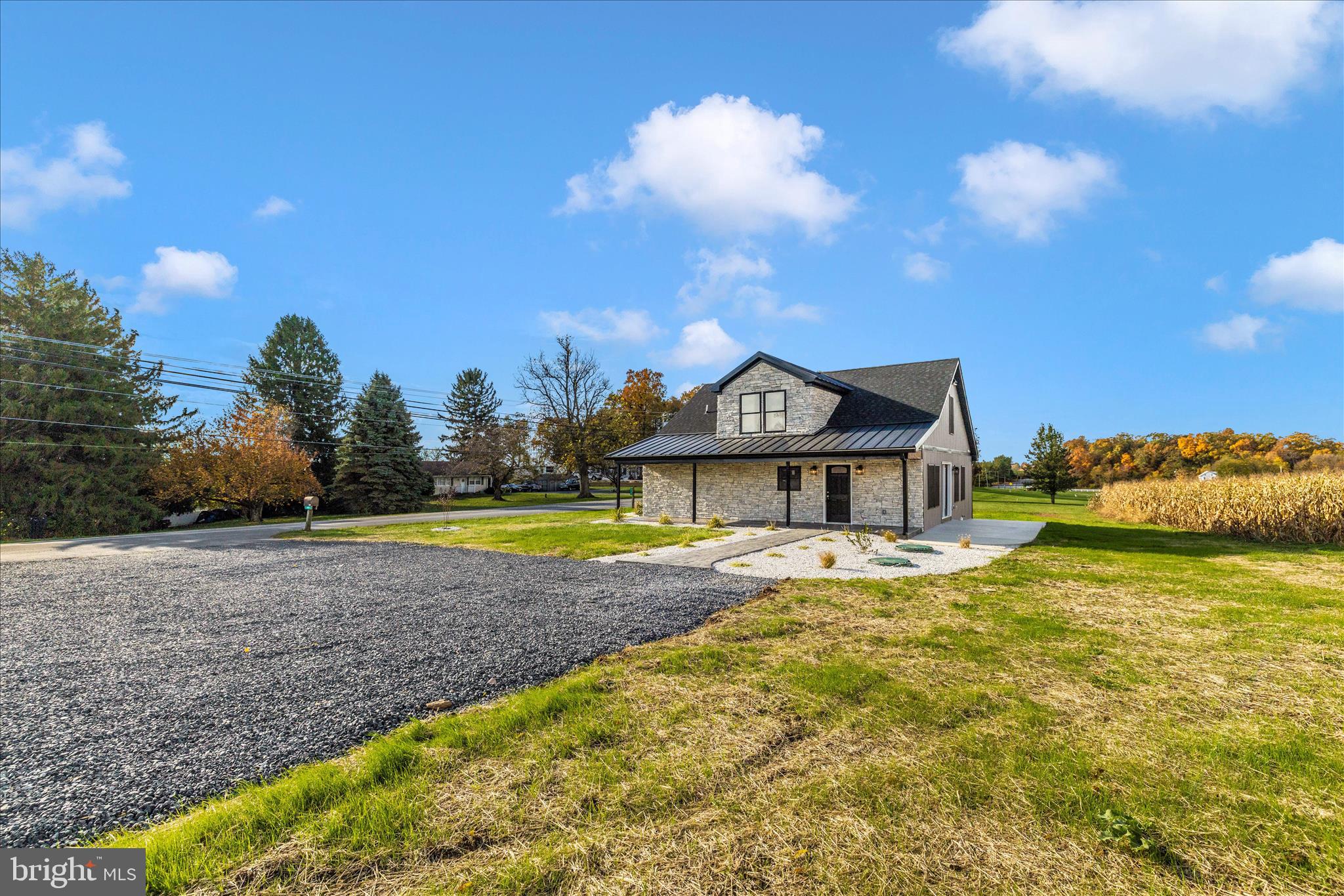 10910 Liberty Road Frederick, MD 21701 - Photo 50 of 51 a view of a house with a yard and roof