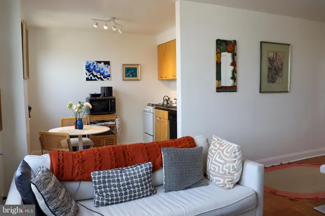 a living room with furniture and a couch