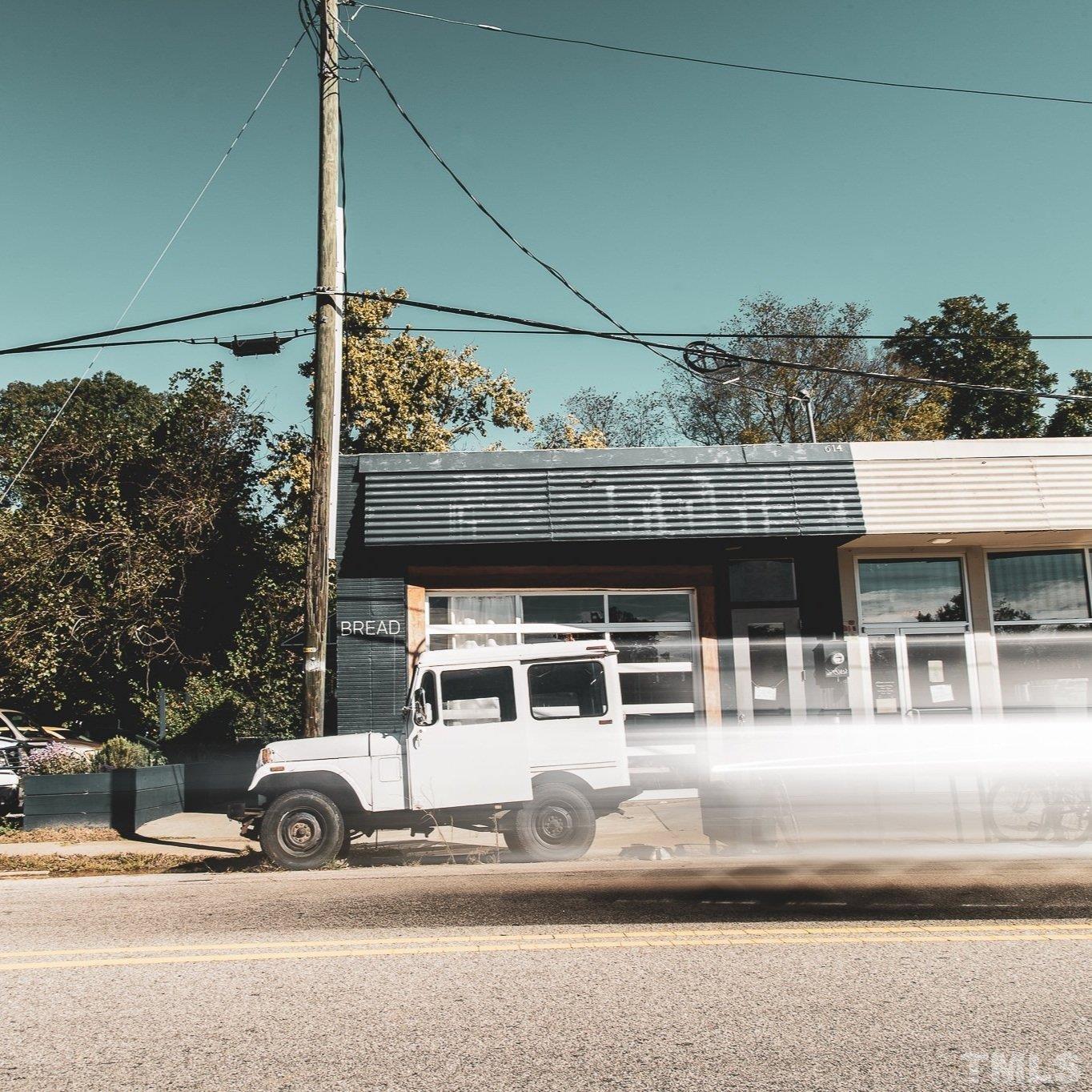 613 South West Street Raleigh, NC 27601 - Photo 14 of 18 a view of a car parked in front of a building