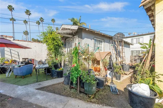 an aerial view of a houses with outdoor space