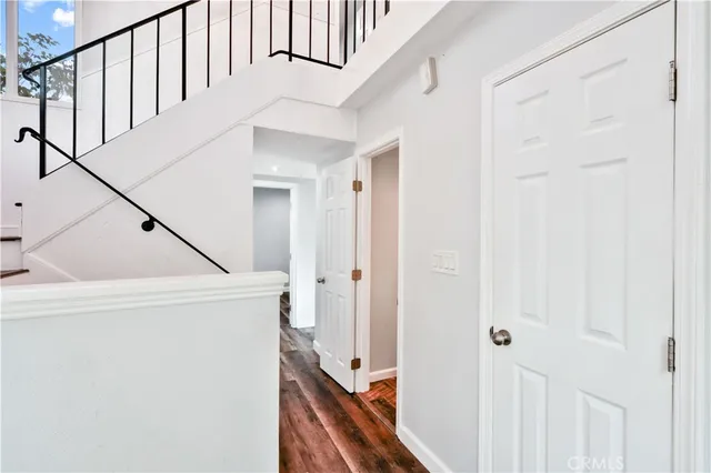 a view of a hallway with staircase