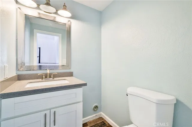 a bathroom with a sink and a toilet