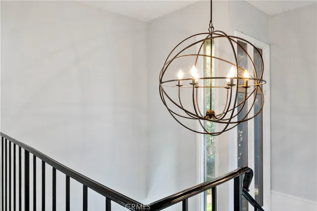 a view of staircase with wooden floor