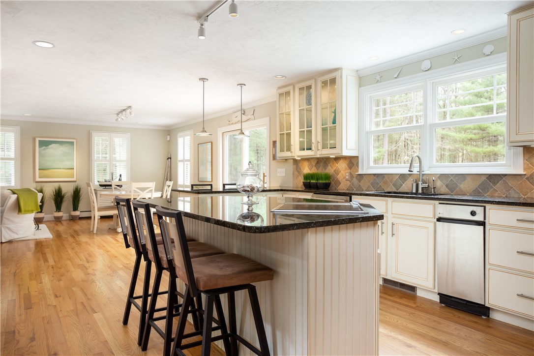 9 Cedar Meadows Road Charlestown, RI 02813 - Photo 14 of 39 Fabulous custom kitchen with 2 burner WOLF induction cooking on center island, in addition to the regular cooktop.