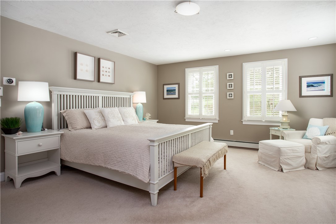 9 Cedar Meadows Road Charlestown, RI 02813 - Photo 20 of 39 Spacious Master bedroom with Master Bath and large walk-in closet.