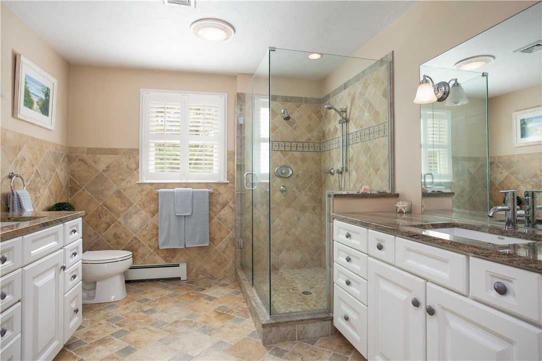 9 Cedar Meadows Road Charlestown, RI 02813 - Photo 22 of 39 Gorgeous Master Bath with granite, double sinks, tile floor and glass & tile shower