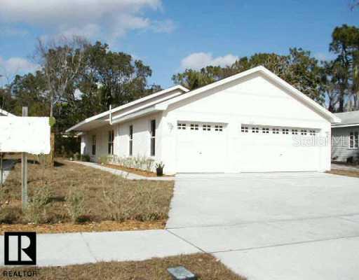 209 East Klosterman Road Tarpon Springs, FL 34689 - Photo 1 of 1 Exterior Front
