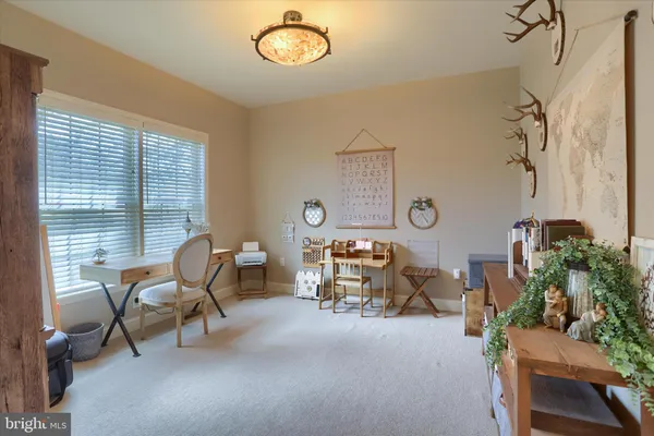 a view of a livingroom with furniture and window