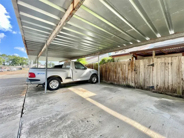 a view of yard with swimming pool