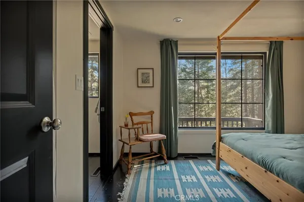 a view of front door and bedroom