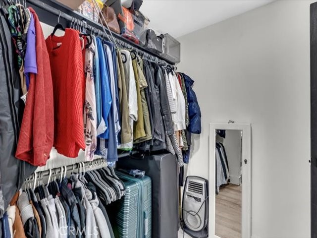 14091 Highview Trail Redding, CA 96003 - Photo 18 of 61 a view of walk in closet with clothes