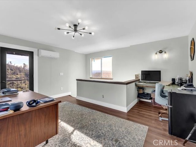 14091 Highview Trail Redding, CA 96003 - Photo 28 of 61 a living room with furniture and a flat screen tv