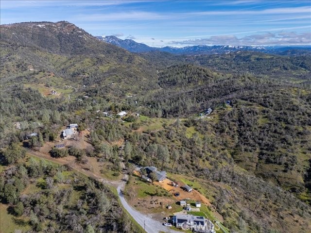 14091 Highview Trail Redding, CA 96003 - Photo 42 of 61 a view of a forest with mountains in the background