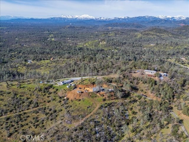 14091 Highview Trail Redding, CA 96003 - Photo 46 of 61 a view of a field with mountains in the background