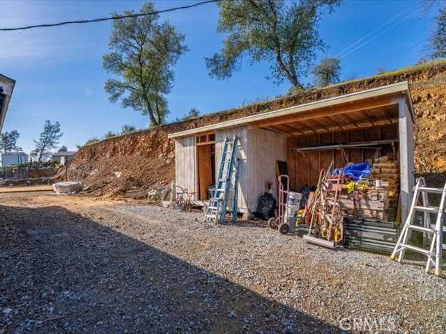 14091 Highview Trail Redding, CA 96003 - Photo 58 of 61 a view of a storage room with a table and chairs