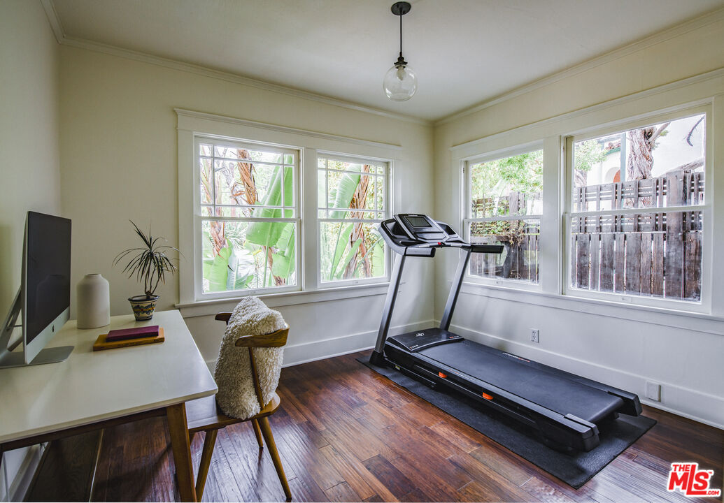 2124 Ridgeview Avenue Los Angeles, CA 90041 - Photo 19 of 33 a view of a workspace with furniture and a window