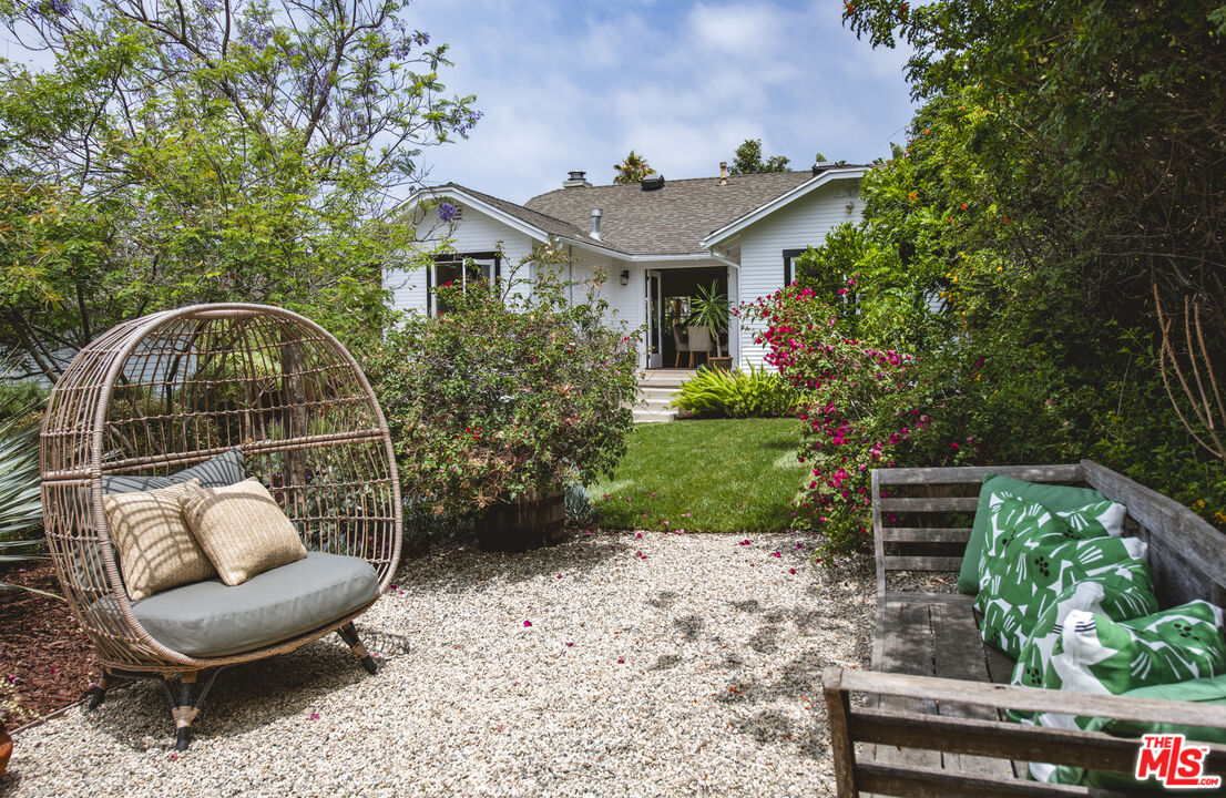 2124 Ridgeview Avenue Los Angeles, CA 90041 - Photo 23 of 33 a front view of a house with garden