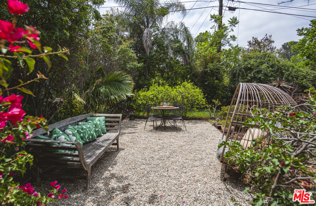 2124 Ridgeview Avenue Los Angeles, CA 90041 - Photo 24 of 33 a garden with flowers in front of it