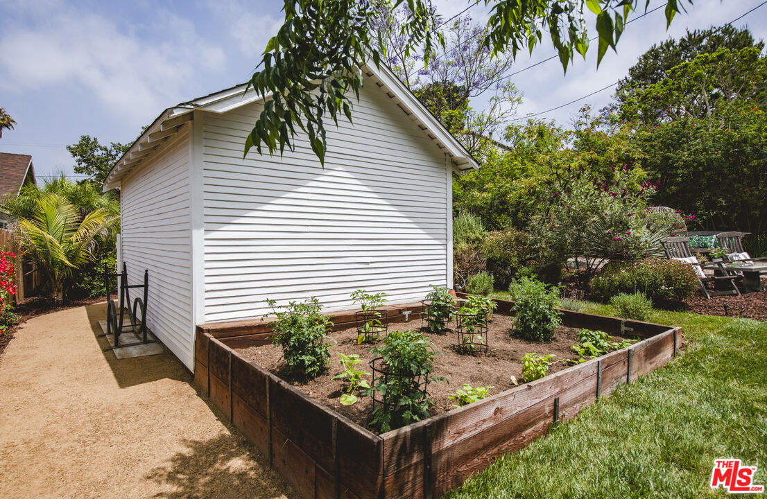 2124 Ridgeview Avenue Los Angeles, CA 90041 - Photo 30 of 33 a view of a backyard with plants and a patio