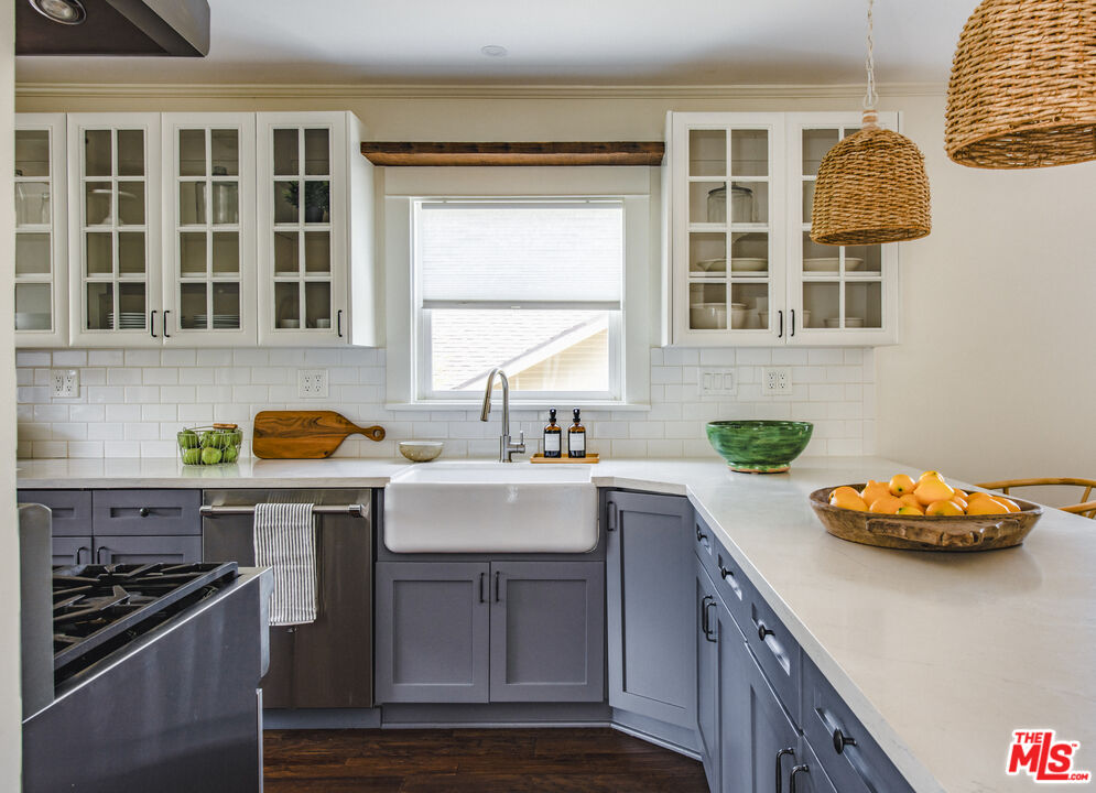 2124 Ridgeview Avenue Los Angeles, CA 90041 - Photo 10 of 33 a kitchen with a sink and cabinets