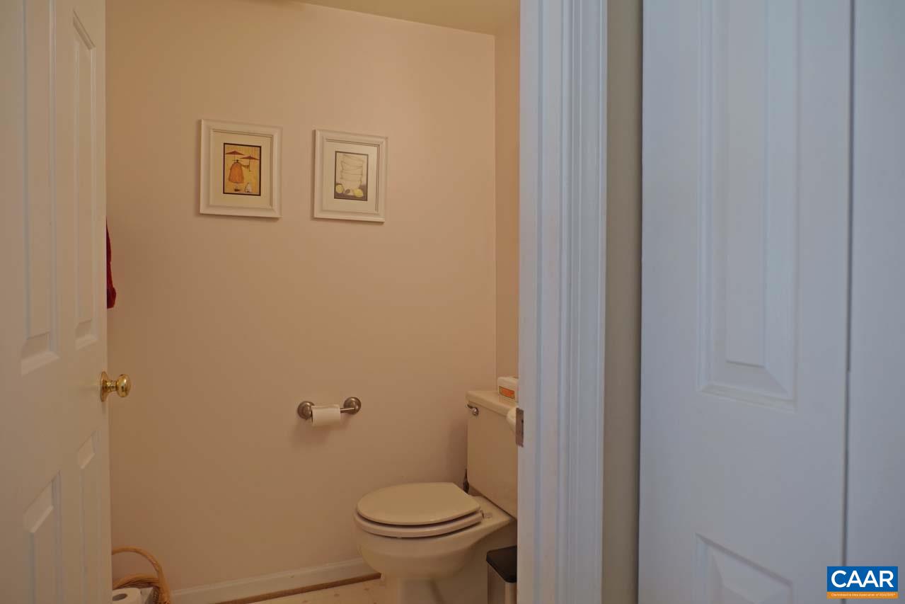 1303 Wimbledon Way Charlottesville, VA 22901 - Photo 22 of 47 a white toilet sitting next to a shower