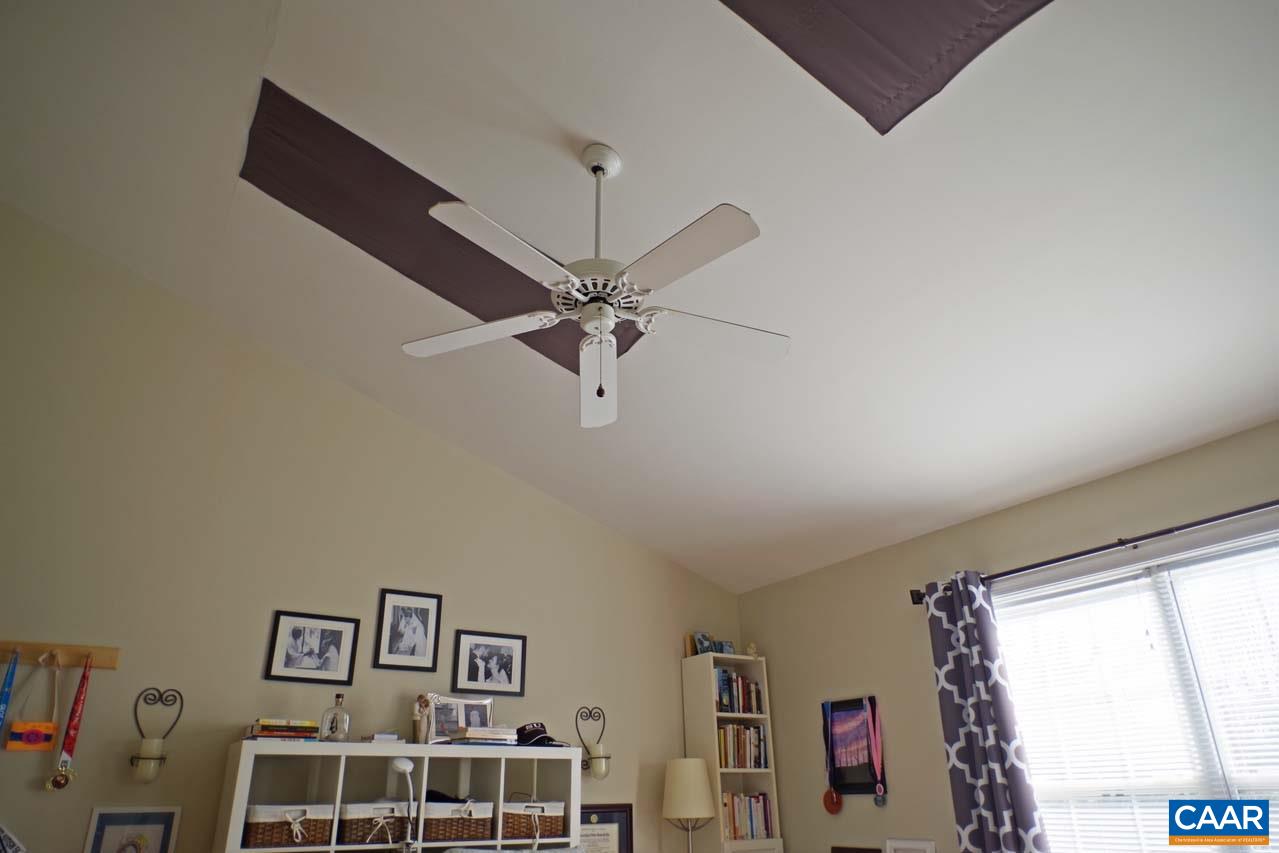 1303 Wimbledon Way Charlottesville, VA 22901 - Photo 26 of 47 a view of a livingroom with a ceiling fan and window