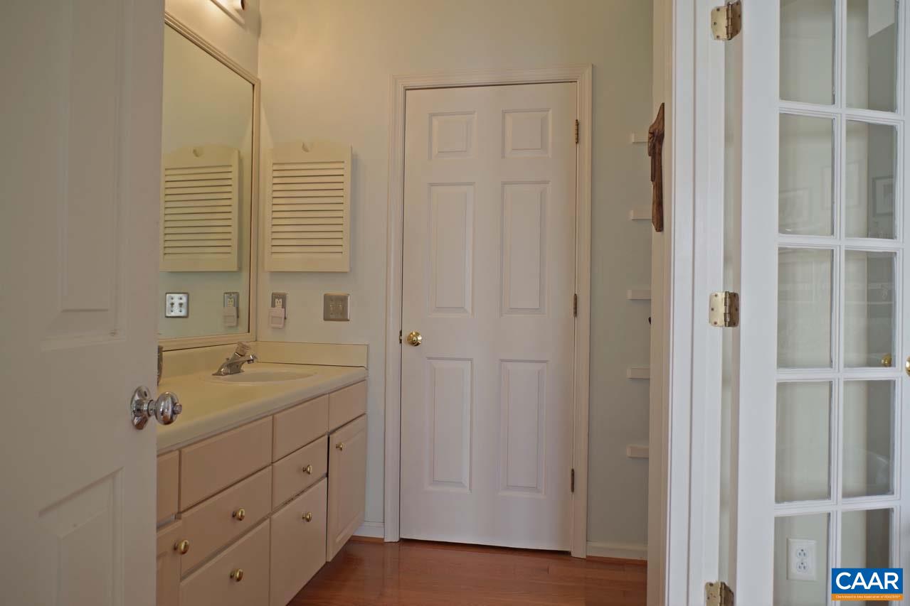 1303 Wimbledon Way Charlottesville, VA 22901 - Photo 30 of 47 a spacious bathroom with a shower and a sink