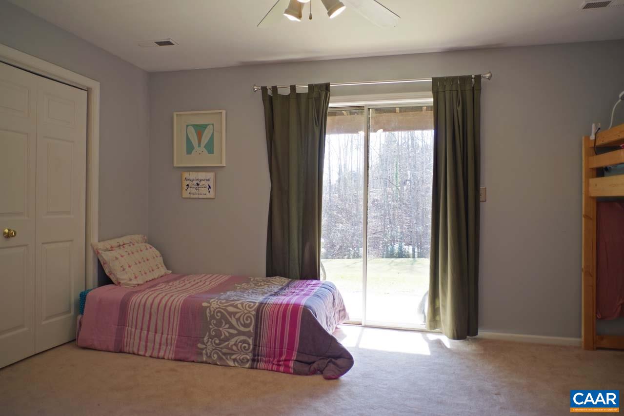 1303 Wimbledon Way Charlottesville, VA 22901 - Photo 43 of 47 a spacious bedroom with a large bed and a window