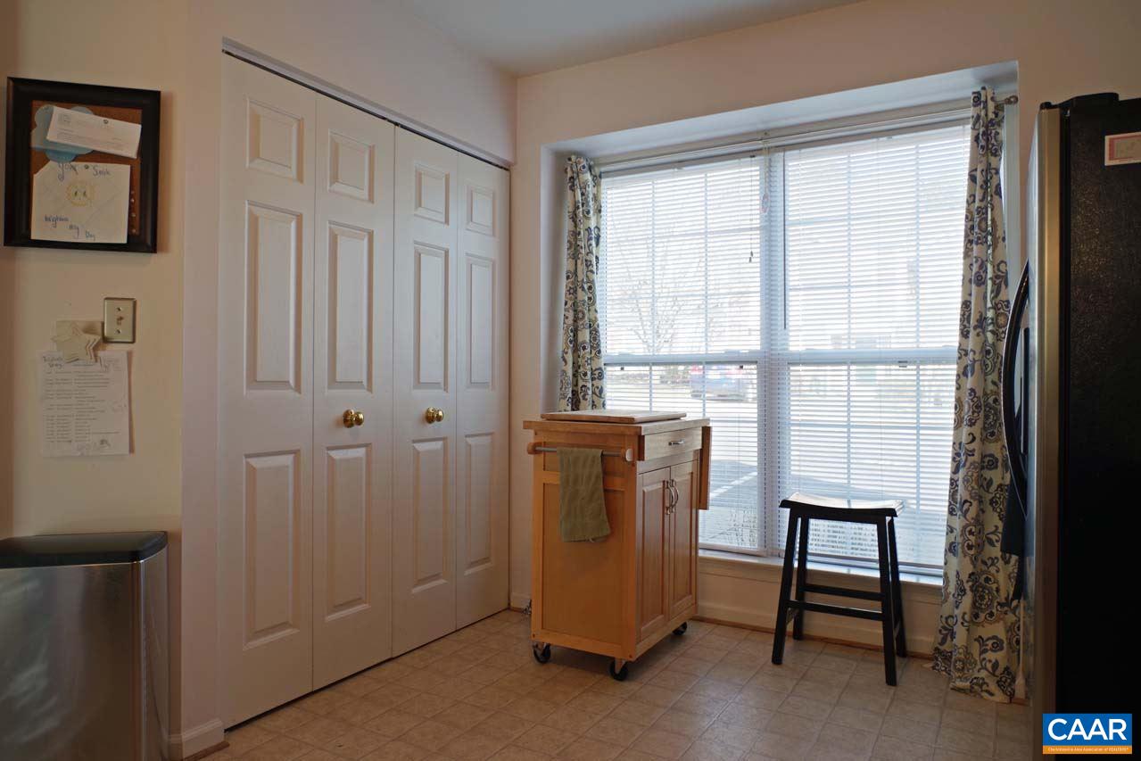 1303 Wimbledon Way Charlottesville, VA 22901 - Photo 9 of 47 a view of a room that has a window and a kitchen
