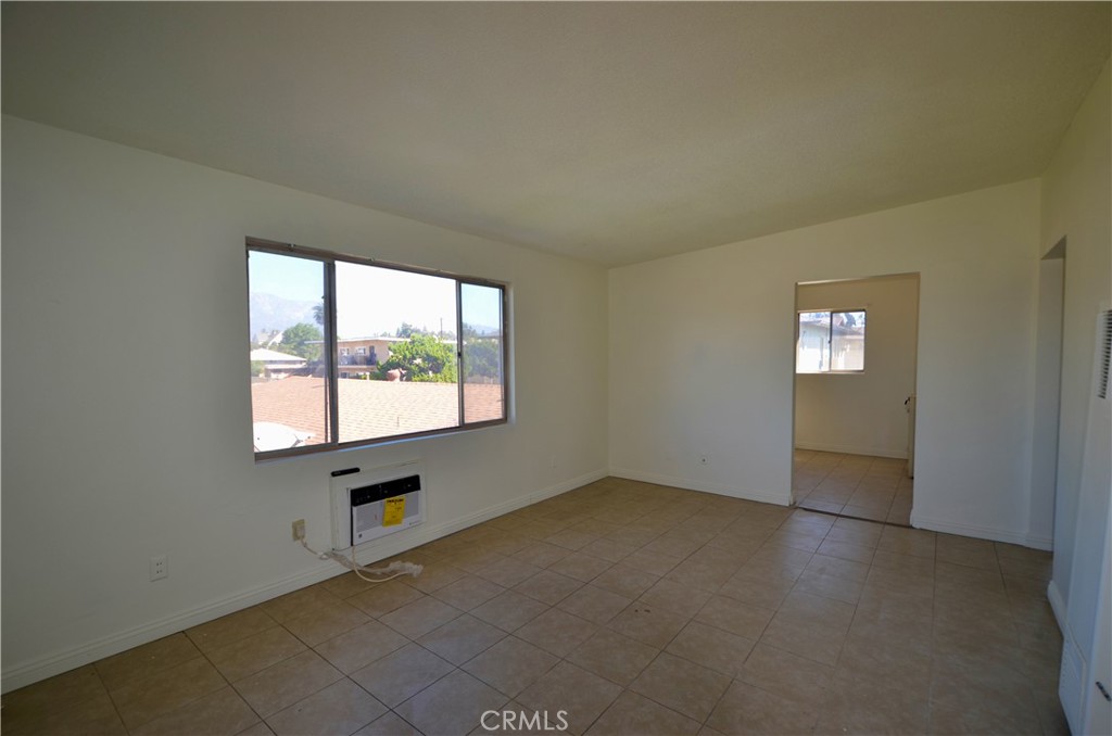 5147 Canoga Street Montclair, CA 91763 - Photo 7 of 10 an empty room with windows