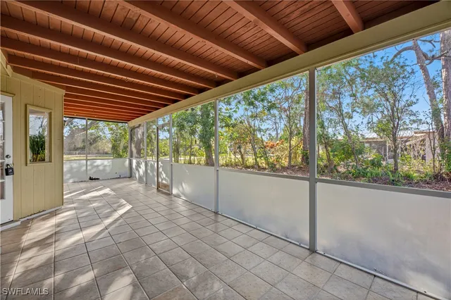 a bathroom with a large window