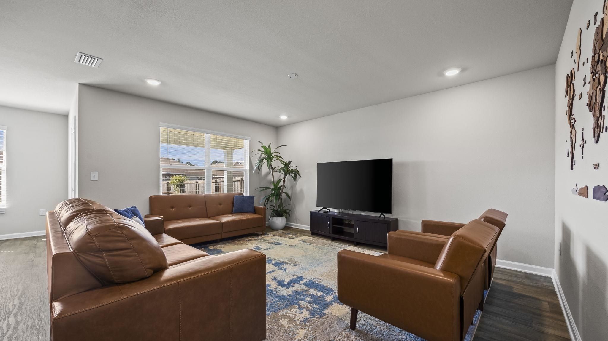 224 Burnston Way Foley, AL 36535 - Photo 8 of 42 Living area featuring wood finished floors and recessed lighting