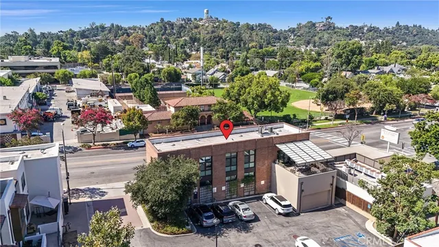 a view of city from balcony with furniture