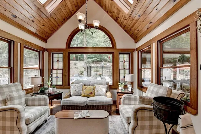 a bathroom with a sink a toilet and shower curtain