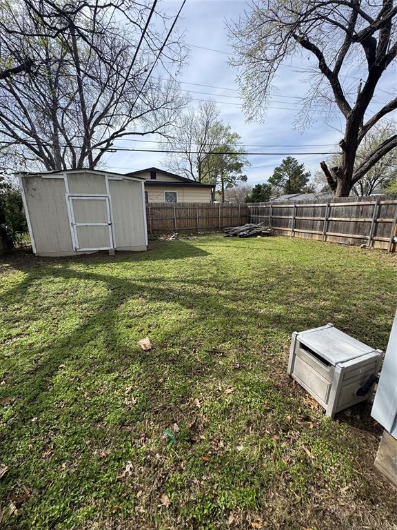 629 Harrison Lane Hurst, TX 76053 - Photo 16 of 20 a backyard of a house with lots of green space