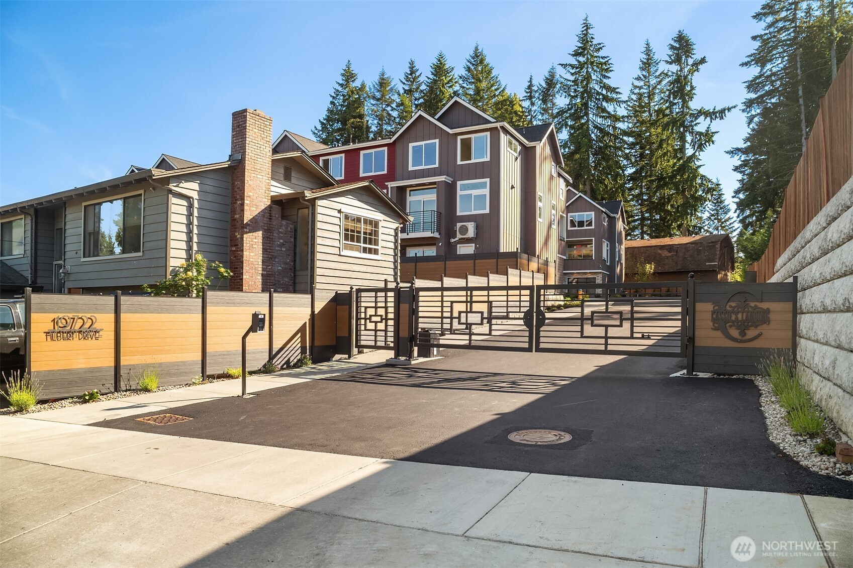 19722 Filbert Drive, Unit 3 Bothell, WA 98012 - Photo 2 of 36 a front view of a house with a garage