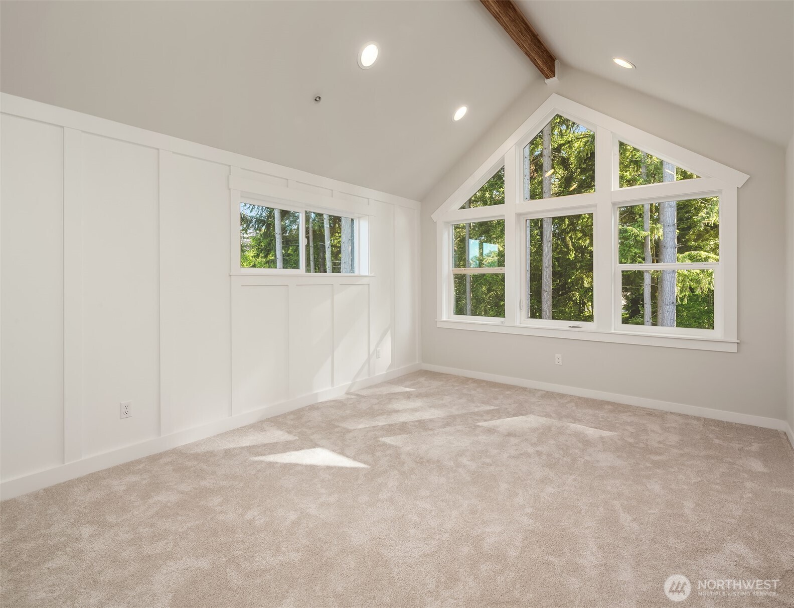 19722 Filbert Drive, Unit 3 Bothell, WA 98012 - Photo 26 of 36 an empty room with large windows