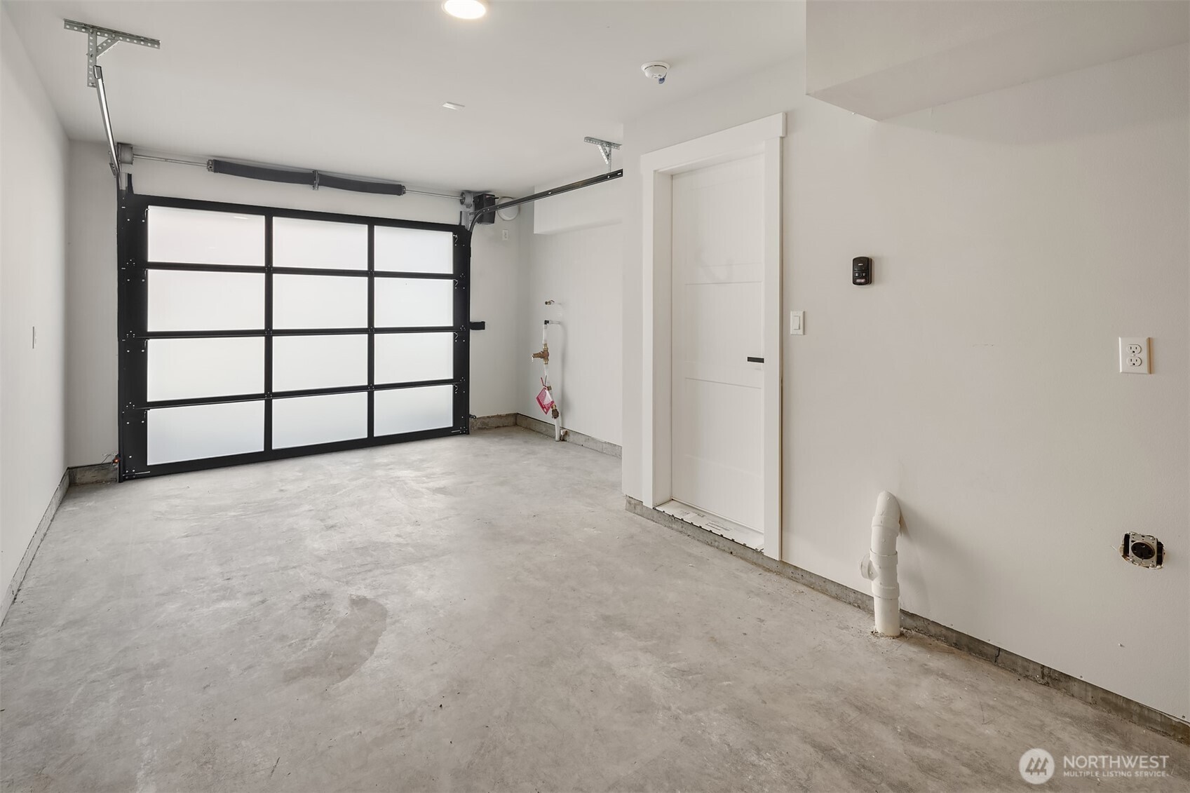 19722 Filbert Drive, Unit 3 Bothell, WA 98012 - Photo 33 of 36 a view of a garage