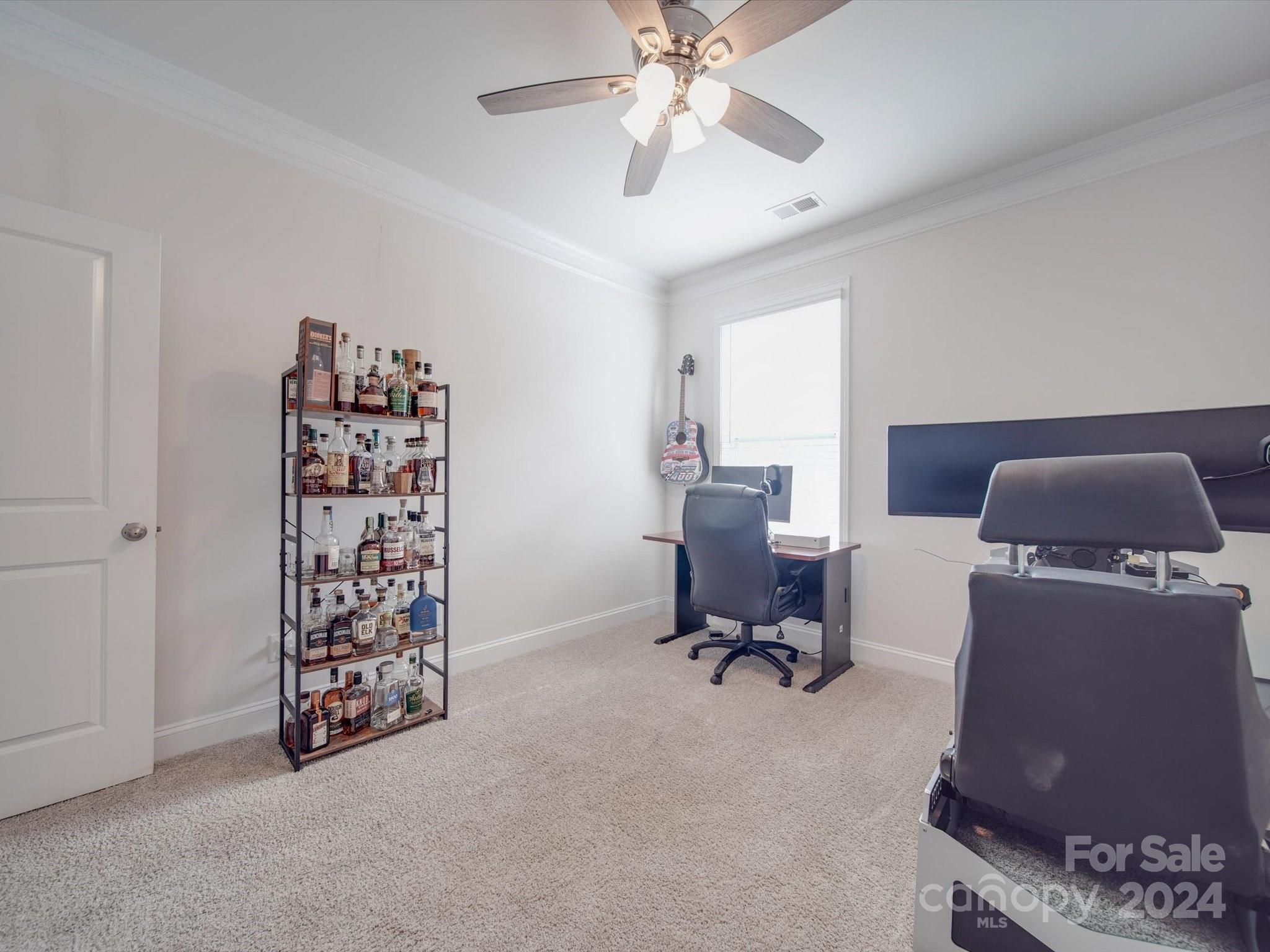 5901 Redwood Pine Road Concord, NC 28027 - Photo 19 of 39 a workspace with furniture and a ceiling fan